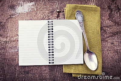 Open empty notebook on wooden background Stock Photo