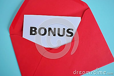Open envelope with message BONUS.Business concept for Reward for good performance Extra dividend and money added to wages Stock Photo