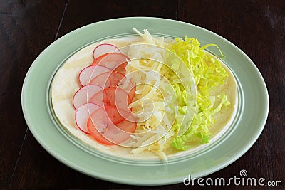 Open face cheese and veggie wrap Stock Photo