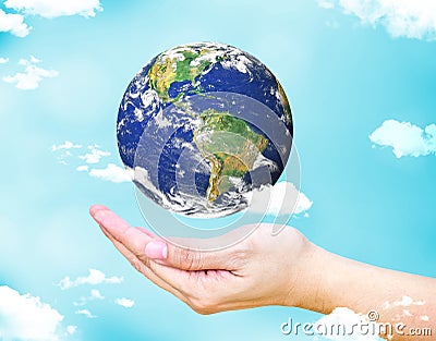 Open female hand with floating world globe and cloud with light Stock Photo