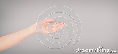 Open Female hand on grey background copy space Stock Photo