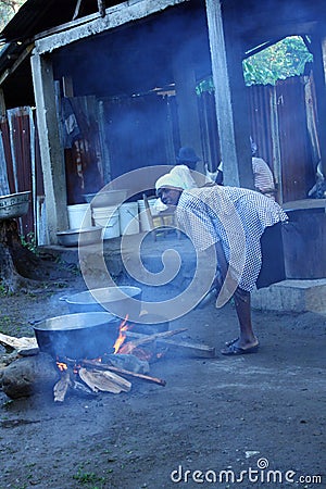 Open fire cooking in rural Haiti. Editorial Stock Photo