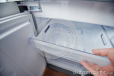 Open fridge freezer container Stock Photo