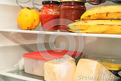 Open fridge with usual food Stock Photo