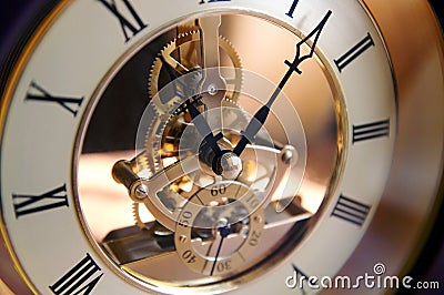 Open-gearing clock on a table Stock Photo