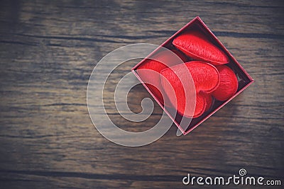 Open Gift Box and red heart in box surprise red present box with full heart for gift Stock Photo