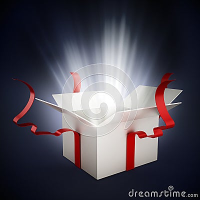 Open giftbox on dark background Stock Photo