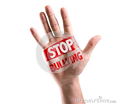 Open hand raised with the text: Stop Bullying isolated on white background Stock Photo