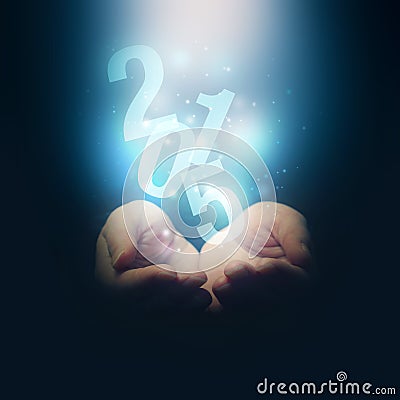 Open hands holding number 2015. Happy New Year. Stock Photo