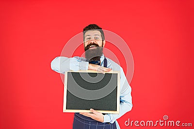 Open hours. Hipster bartender show blackboard copy space. Hipster restaurant staff. Hipster informing you. Man bearded Stock Photo