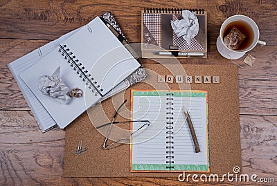 Open Journal Books on Desk Stock Photo