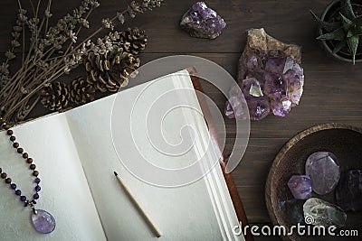 Open Journal or Notebook Surrounded by Amethyst Crystals Dried Lavender and Succulent Plant Stock Photo