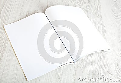 Open magazine with blank pages Stock Photo