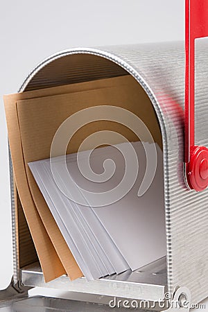 Open metal silver mail box with letters Stock Photo