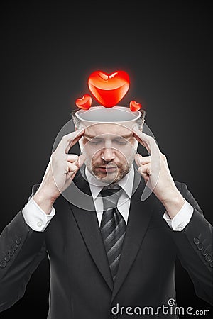 Open minded man with hearts inside Stock Photo