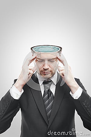 Open minded man with swimming pool inside Stock Photo