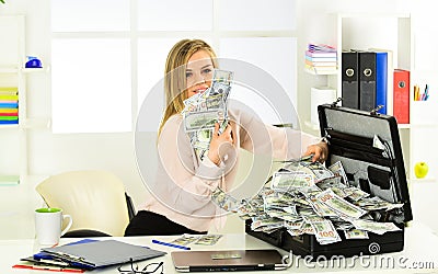 Open moneybox. boss woman with case at workstation. happiness and success. Businesslady hand holding briefcase. suitcase Stock Photo