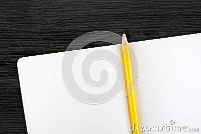 Open notebook and yellow pencil on wooden table,top view, Template mock up for adding your content Stock Photo