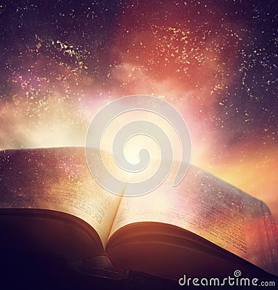 Open old book merged with magic galaxy sky, stars. Literature, h Stock Photo