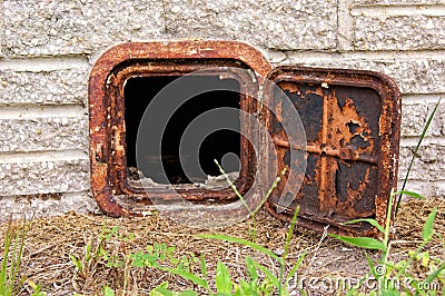 Open old rusted iron door Stock Photo