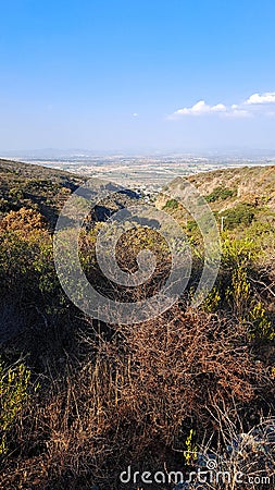 Open pit opal mining in Tequisquiapan Queretaro, Mexico is a natural wonder of towering orange rock formations Stock Photo