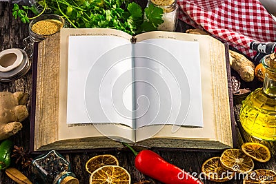 Open recipe book with ingredients Stock Photo