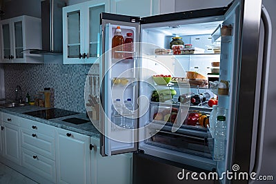 An Open Refrigerator Full Of Healthy Foods Stock Photo