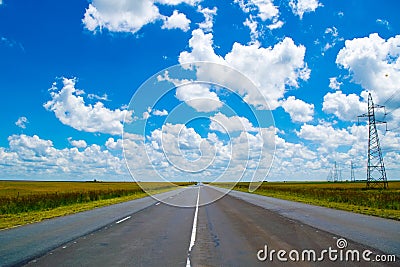 Open road beneath a brilliant blue African sky Stock Photo
