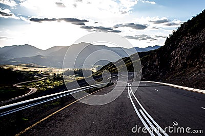 Open road high in the mountains Stock Photo