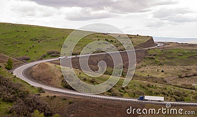 Open Road Semi Trucks Travel Curved Highway Oregon Countryside Stock Photo