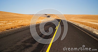 Open Road Two Lane Highway Oregon Landscape Harvested Farmland Stock Photo