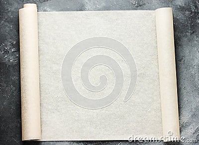 Open roll of baking parchment paper for menu or recipes text Stock Photo