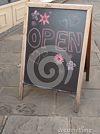 Open sidewalk pavement sign Stock Photo