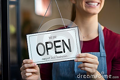 Open sign in a small business shop Stock Photo