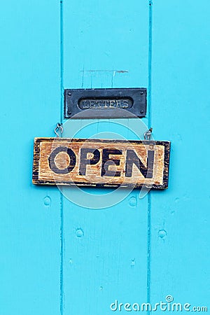 Open Sign on Turquoise Door Stock Photo