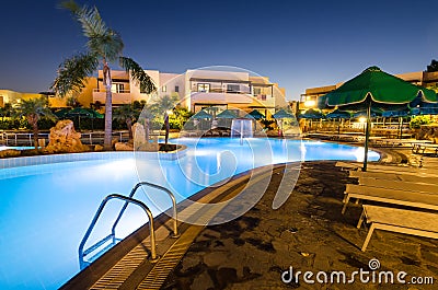 Open swimming pools in Mikri Poli hotel resort in Kolymbia Editorial Stock Photo