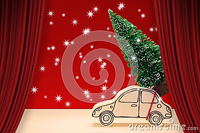 Open theater red curtains against a small pine tree on handmade cartoon toy car - Christmas holiday concept image Stock Photo
