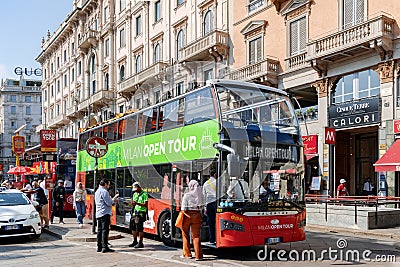 Open-top Hop-on Hop-off Milan Open Tour city sightseeing bus in Milan Editorial Stock Photo