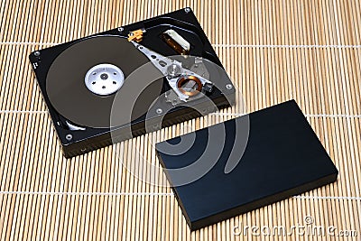 Open USB Hard Disk Drive on wood background Stock Photo