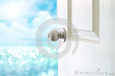 Open white door to sea view for Hello Summer concept Stock Photo