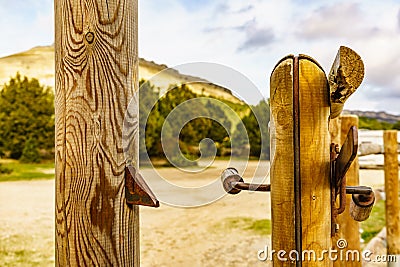 Open wooden fence entrance to a farm Stock Photo