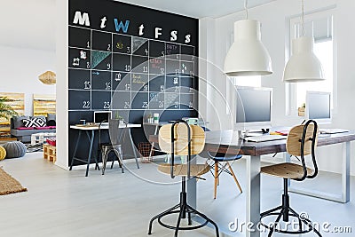 Open workspace with blackboard wall Stock Photo