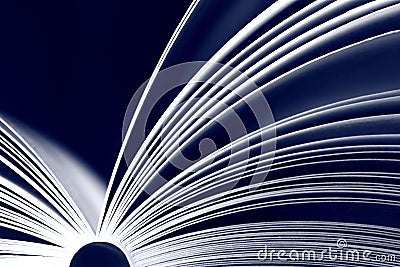 Opened book on black background Stock Photo