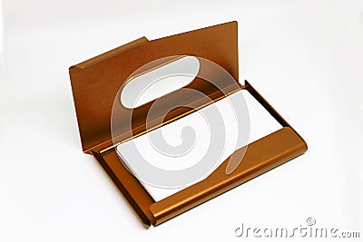 Opened business card holder in golden color on a white background. Stock Photo