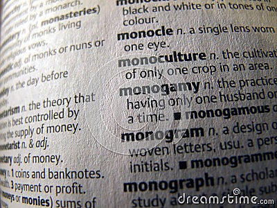 Opened Dictionary - monogamy word Stock Photo