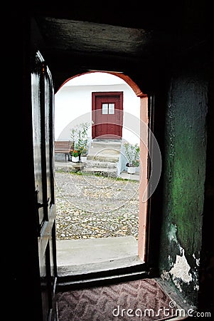 Opened door of church Stock Photo