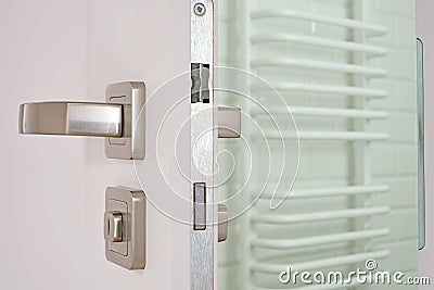 Opened door to the bathroom Stock Photo