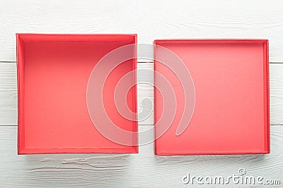 Opened empty red box with lid Stock Photo