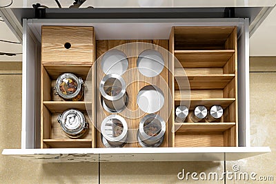 Opened kitchen drawer , a smart solution for kitchen storage and organizing Stock Photo