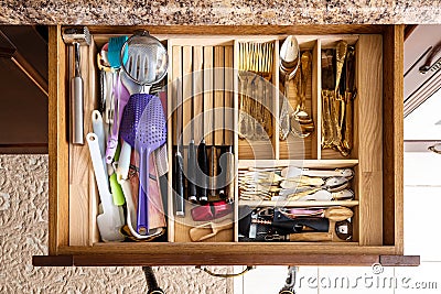 Opened kitchen drawer , a smart solution for kitchen storage and organizing Stock Photo